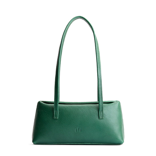 Bacalar | Leather bowler bag with magnetic closure against a white background