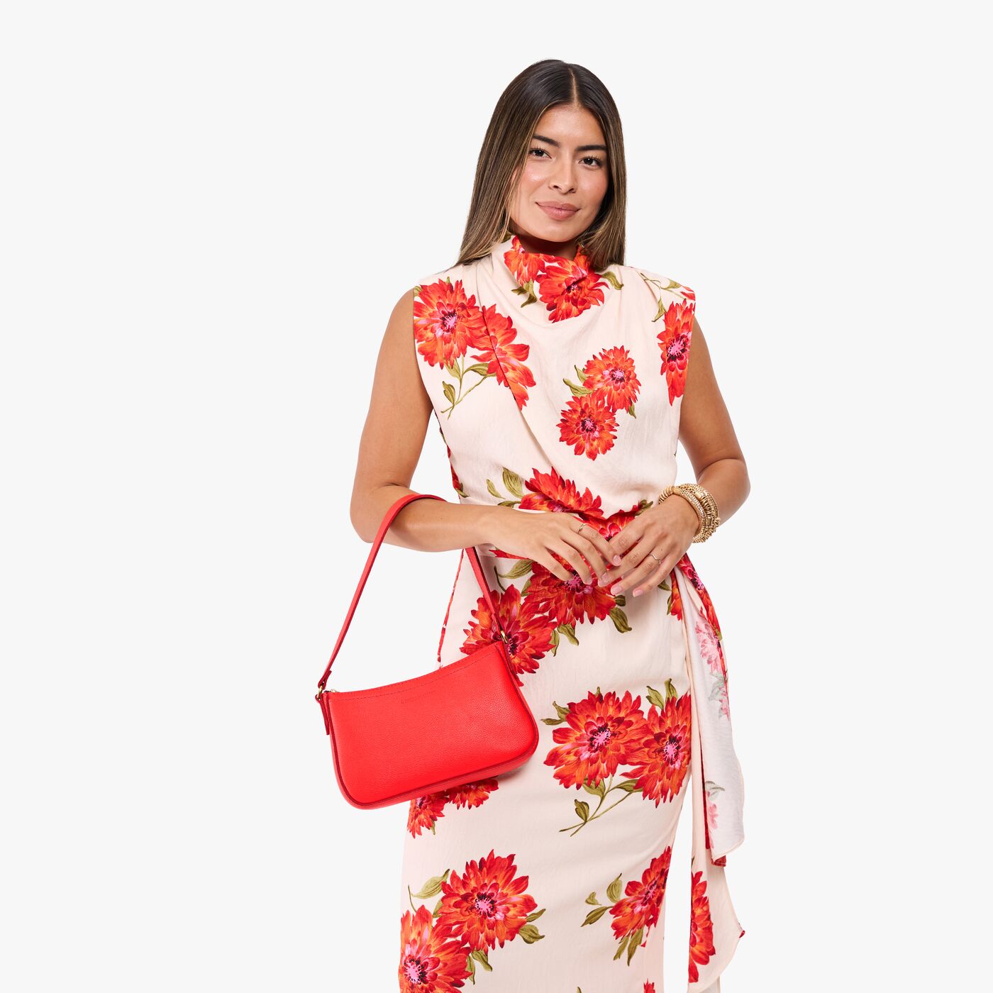 Candy*Small | Model carrying petite bean shaped shoulder bag with a zipper closure