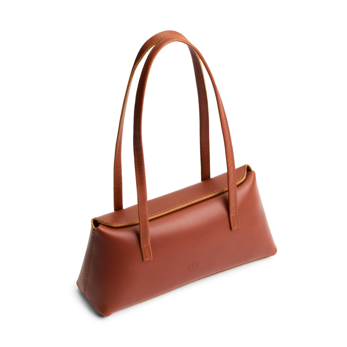 Chestnut | Leather bowler bag with magnetic closure against a white background