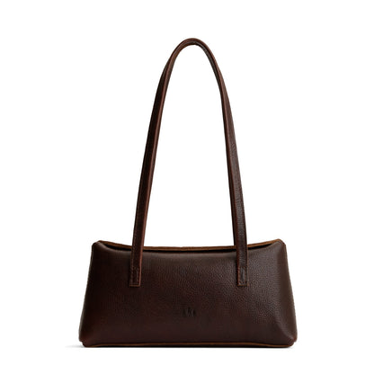 Coldbrew | Leather bowler bag with magnetic closure against a white background
