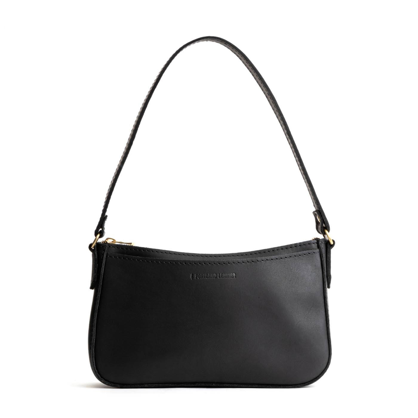 Black*Small | Petite bean shaped shoulder bag with a zipper closure