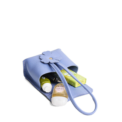 Aster | Wristlet pouch with loop strap and a flower design open