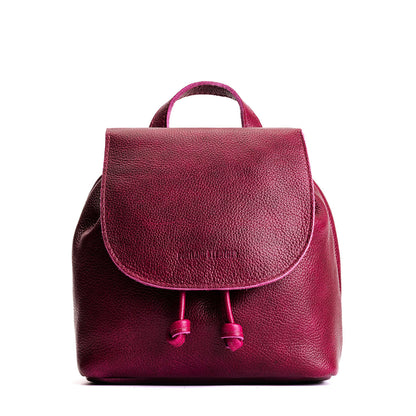 Orchid | Drawstring bucket backpack with snap closure under flap