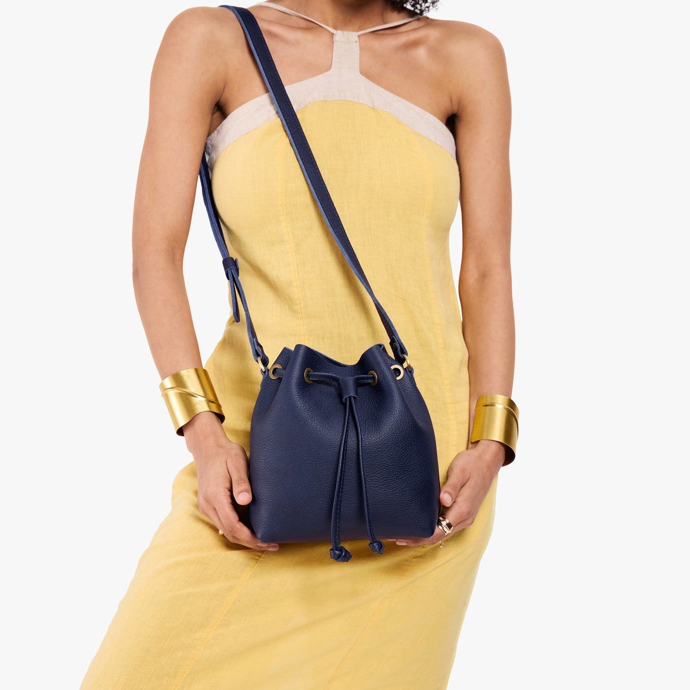 Cobalt*Small | Model wearing slouchy crossbody bag with drawstring closure