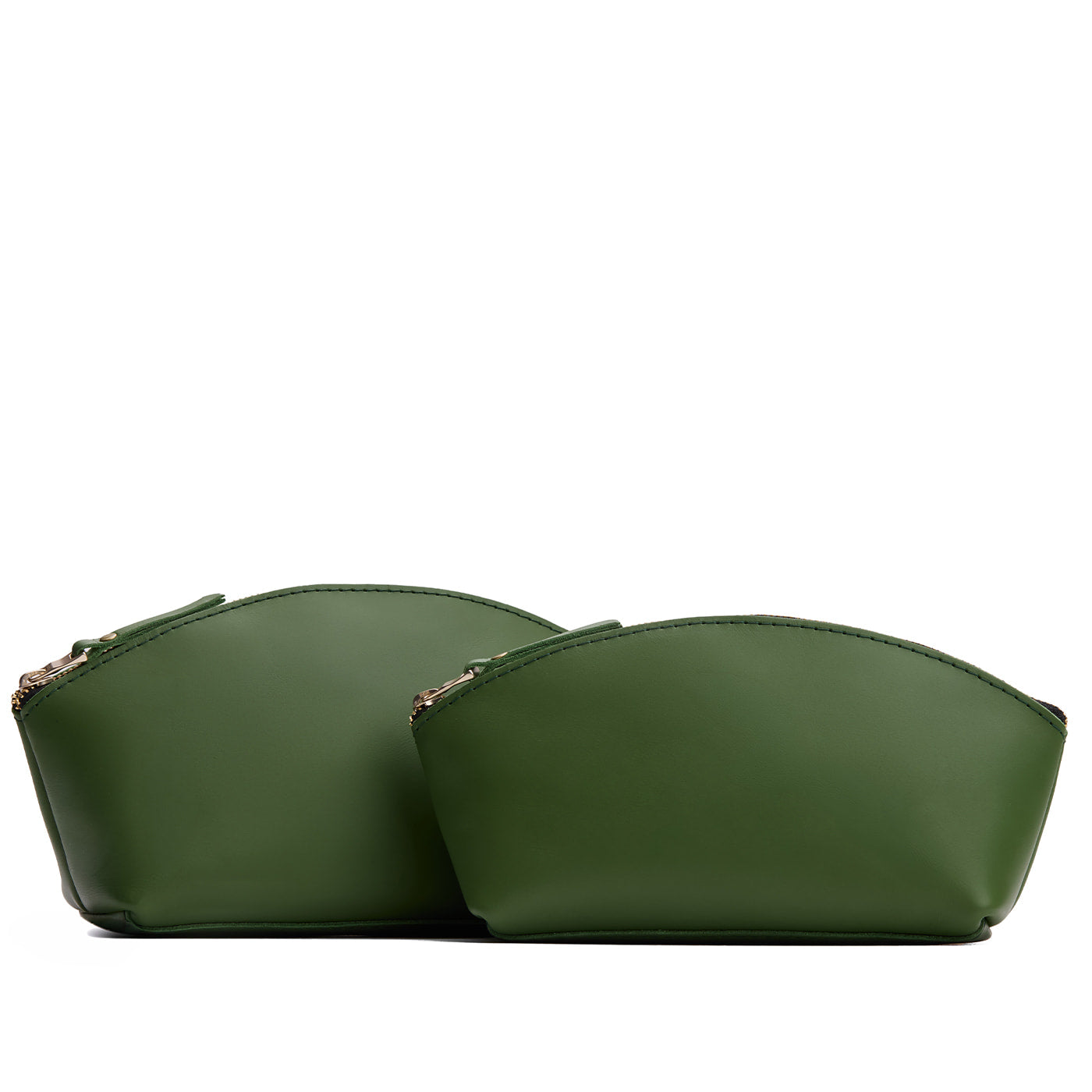 Cactus | Size comparison shot of two spacious leather makeup bags with curved seams and top zipper