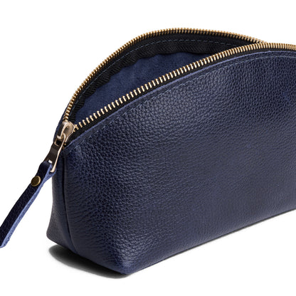 Cobalt | Spacious leather makeup bag with curved seams and top zipper open