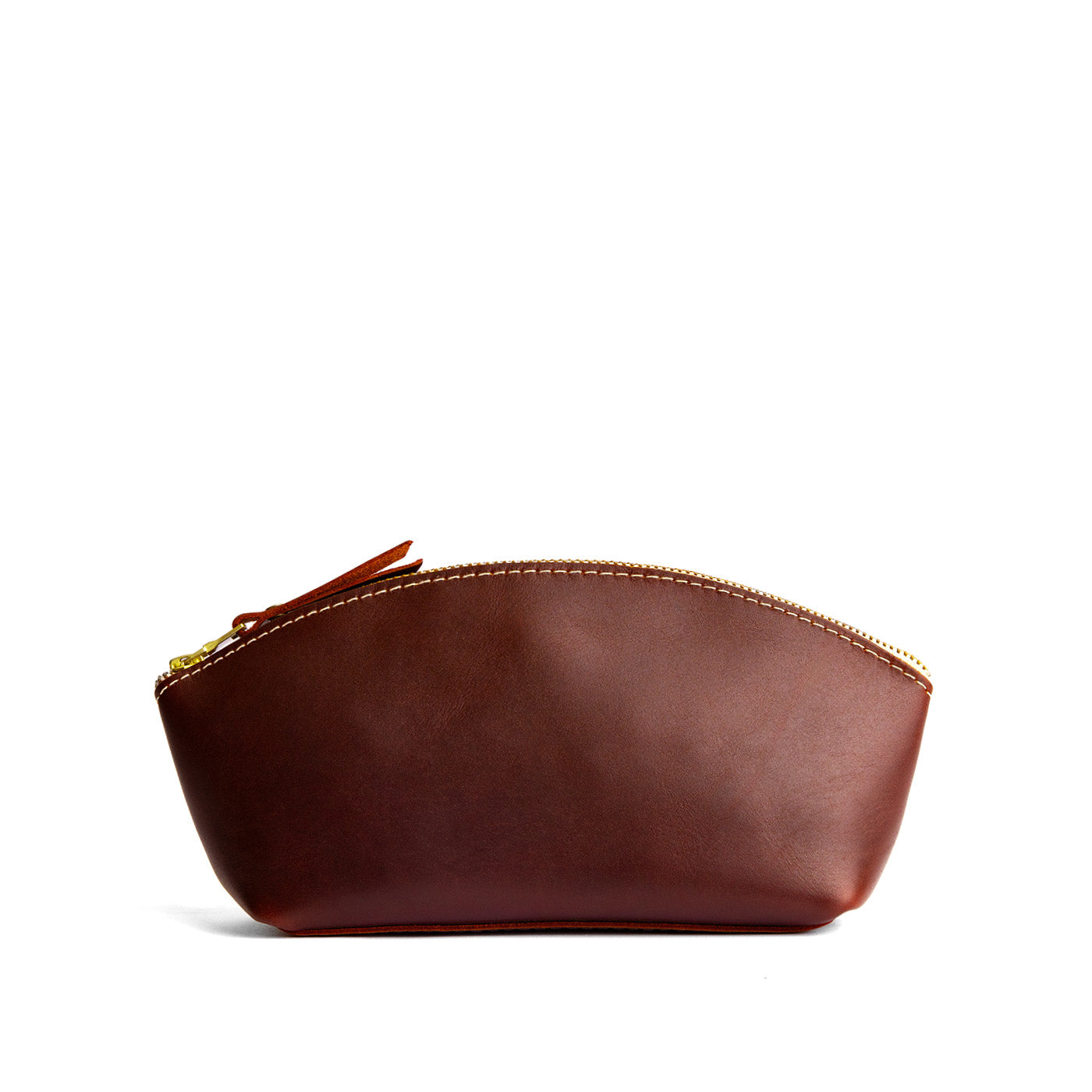 Cognac*Eclipse | Spacious leather makeup bag with curved seams and top zipper