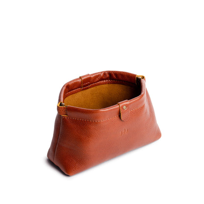 Sienna | Leather pouch with frame top closure and leather pull tab