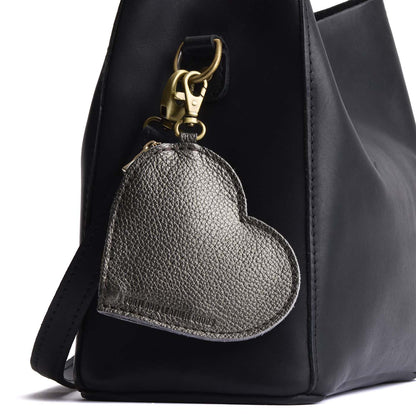 Stardust | Heart-shaped leather pouch keychain with zipper top and lobster clasp