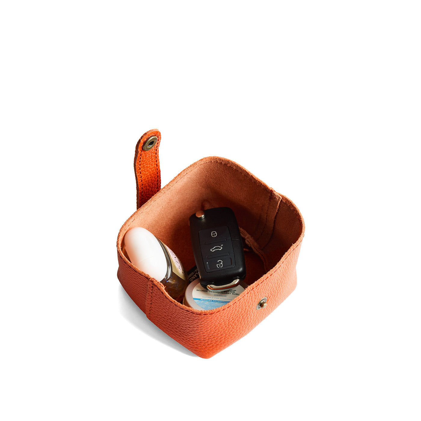 Koi | Foldable square leather pouch with snap closure open