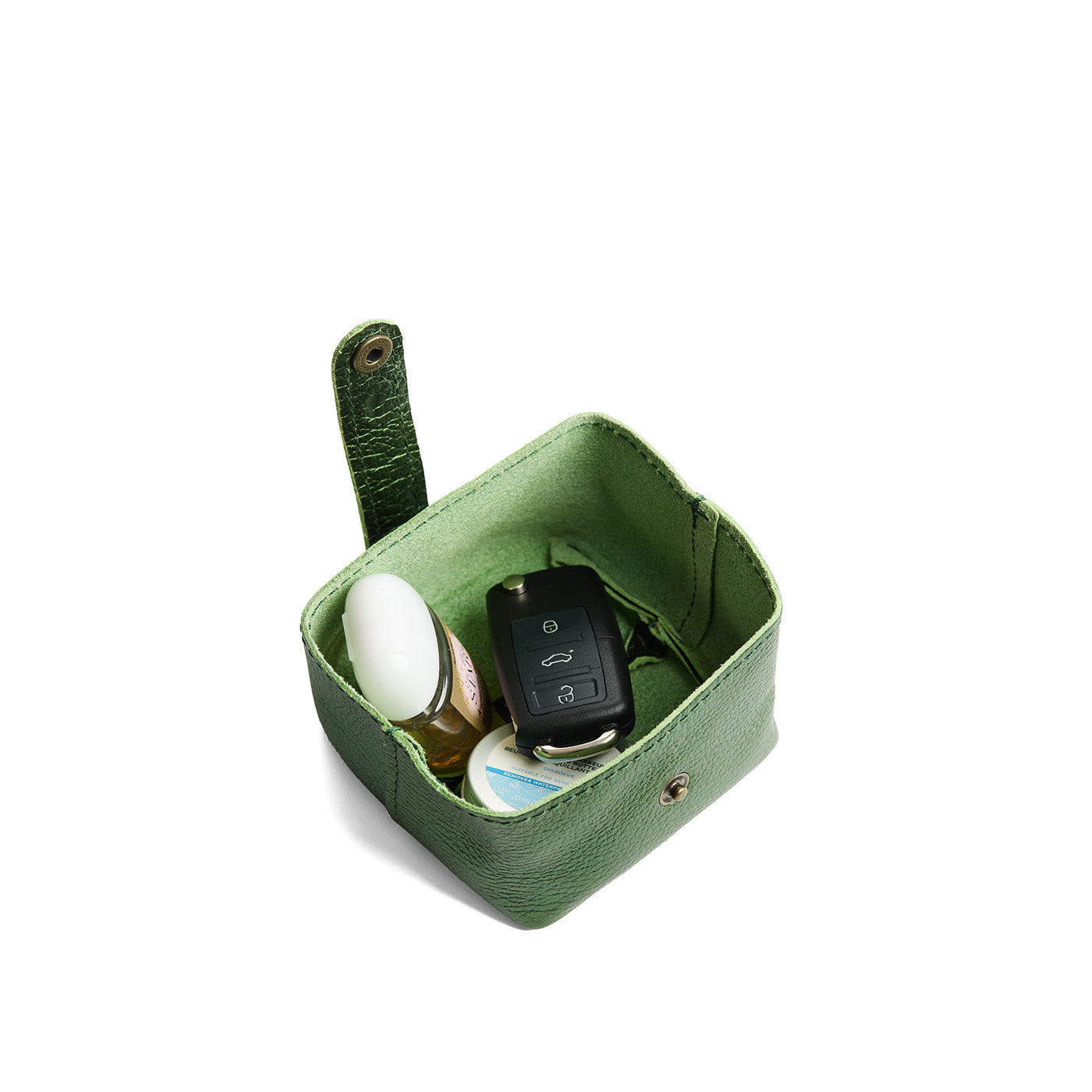 Metallic Greench | Foldable square leather pouch with snap closure open