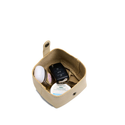 Pebbled Bone | Foldable square leather pouch with snap closure open