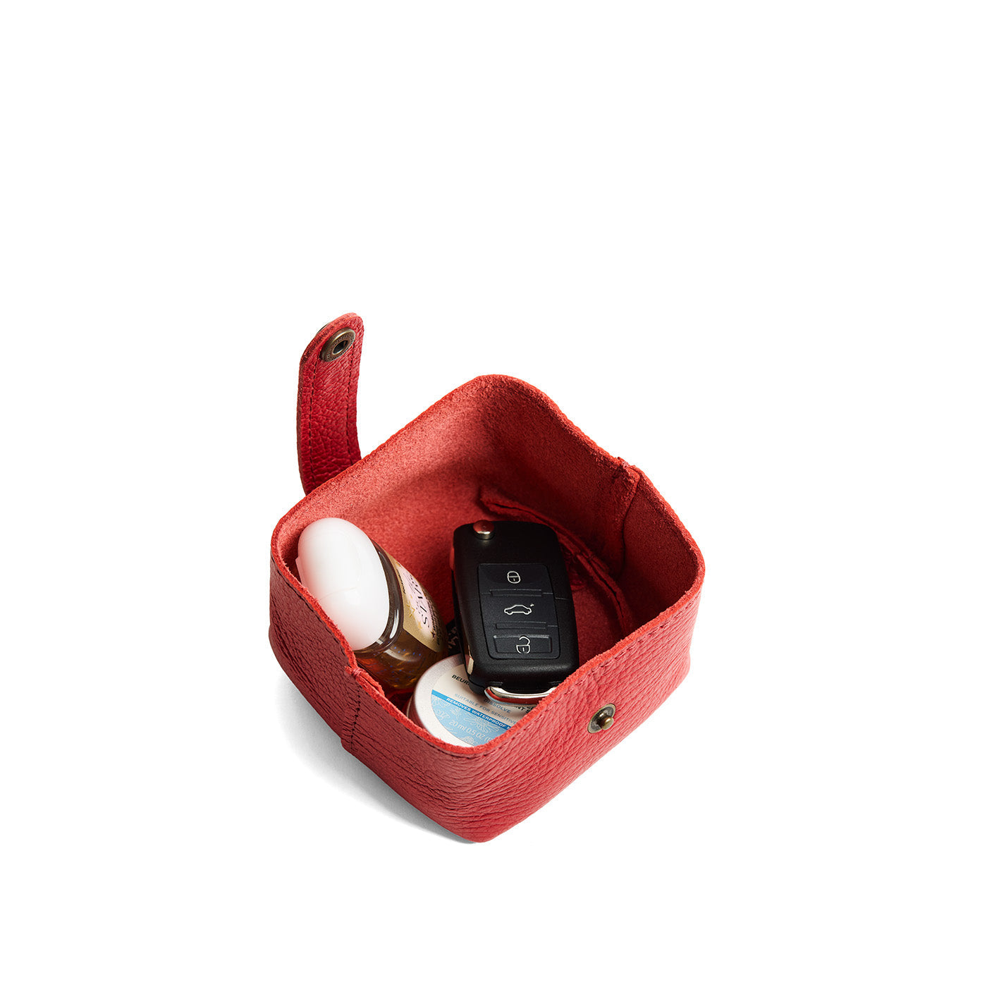 Reba Red | Foldable square leather pouch with snap closure open