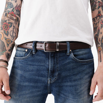 All Variants | A person wearing the Italian Reversable Leather Belt on the brown side