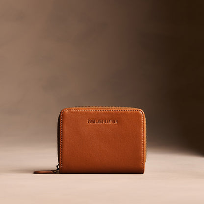 Vintage Tan | Wallet with card and storage pockets on a light brown background