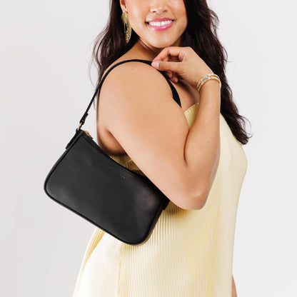 Black*Small | Petite bean shaped shoulder bag with a zipper closure