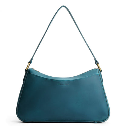 Westward Blue*Large | Large bean shaped shoulder bag with a zipper closure