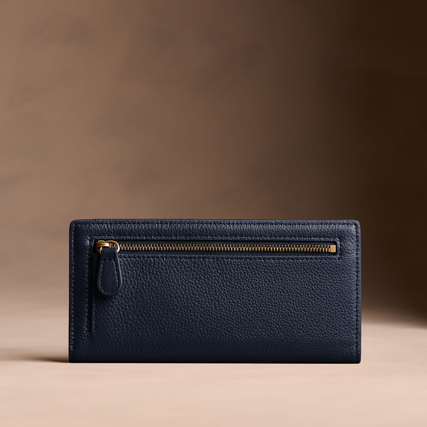 Anchor Blue*Large | Slim leather bifold wallet with multiple card slots and a zippered back pocket - back view