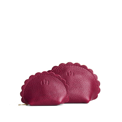 Orchid | Curved leather pouch with zipper and scalloped edges