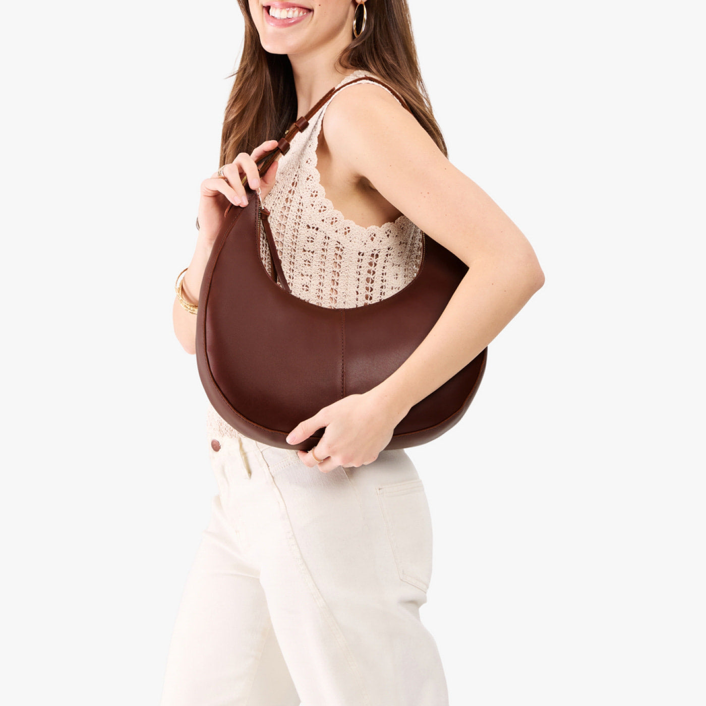 Cognac*Large | Crescent shaped shoulder bag with zipper closure and adjustable strap