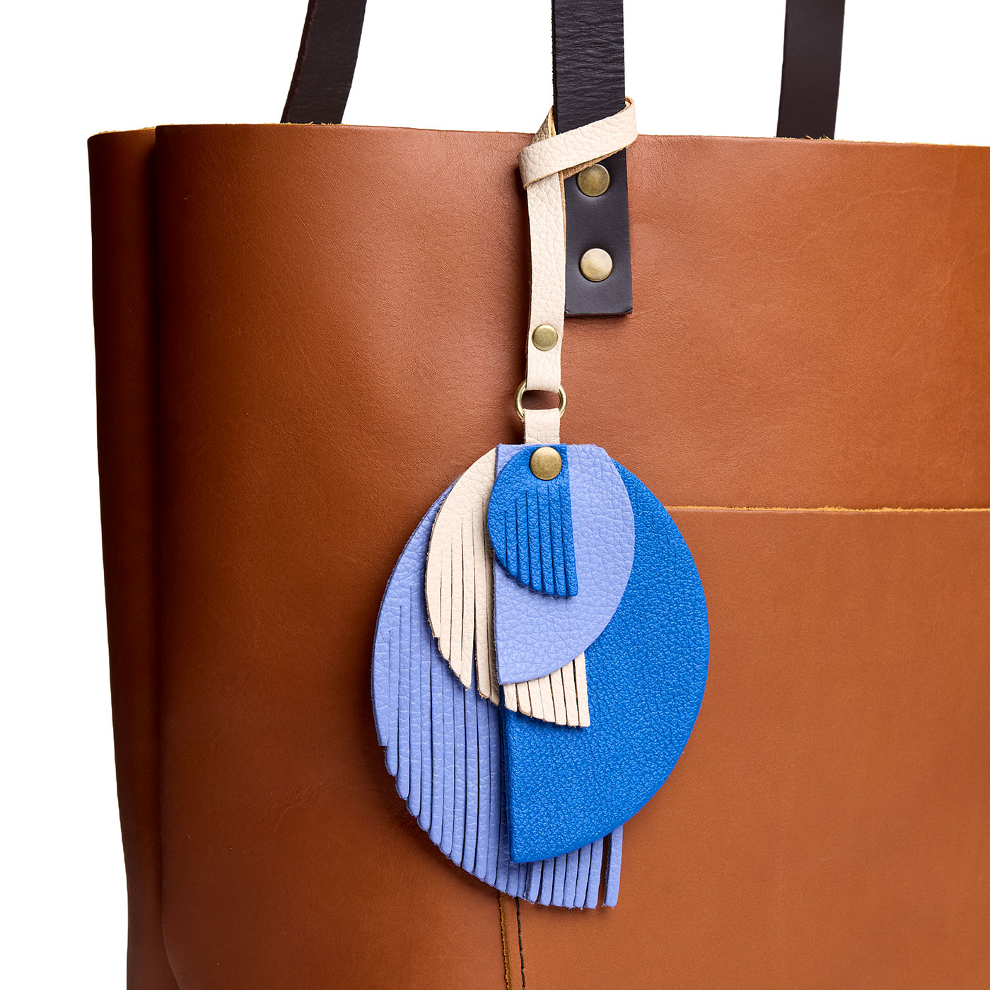 Blue Bowie | Intricately cut leather shapes and fringe