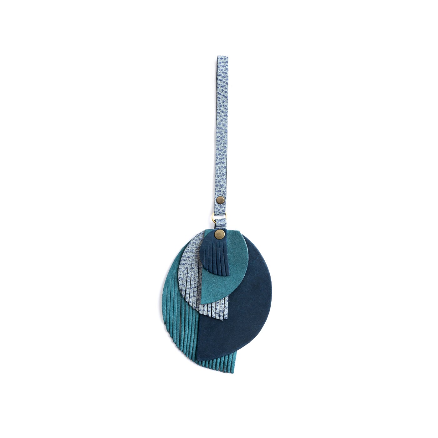 Neptune | Intricately cut leather shapes and fringe