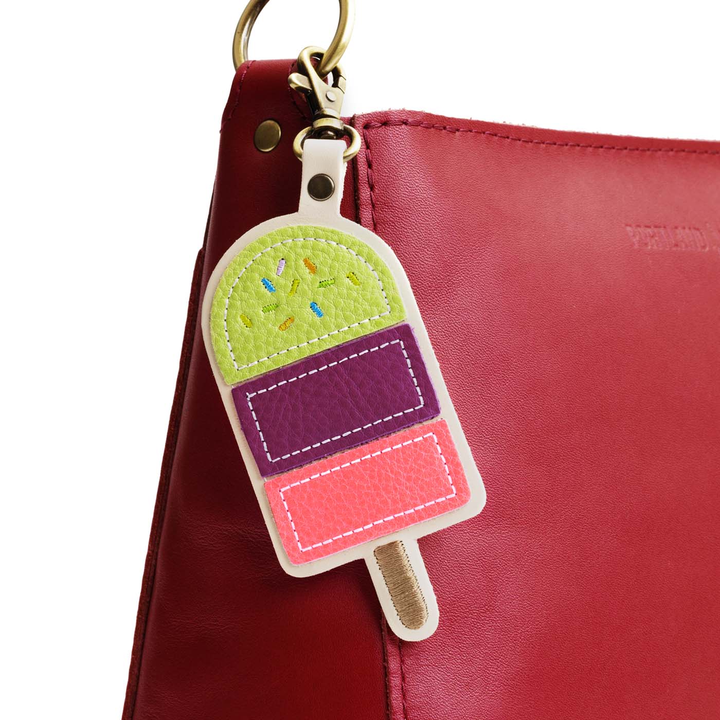 Sugar Snap | Popsicle keychain with a lobster clasp on a bag