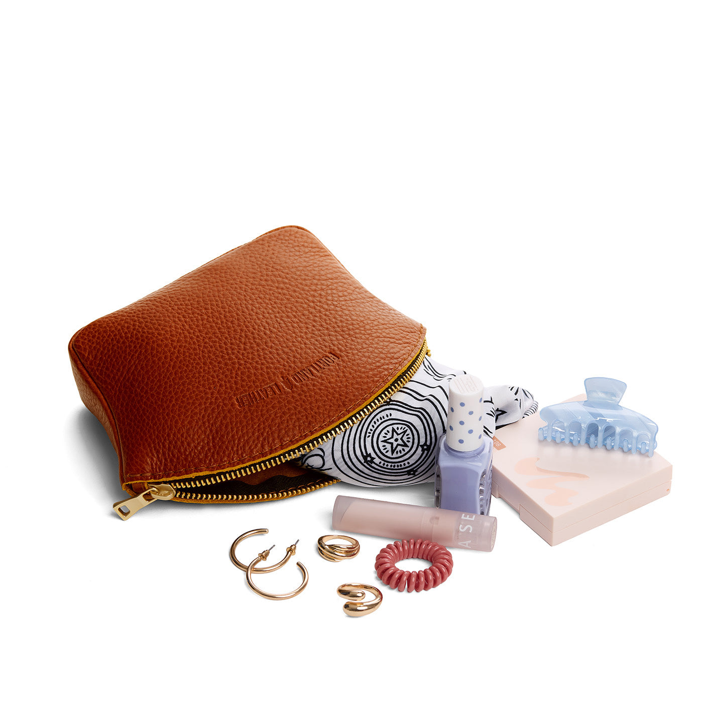 Sienna*Large | Seashell shaped leather makeup bag with curved top zipper and flat bottom