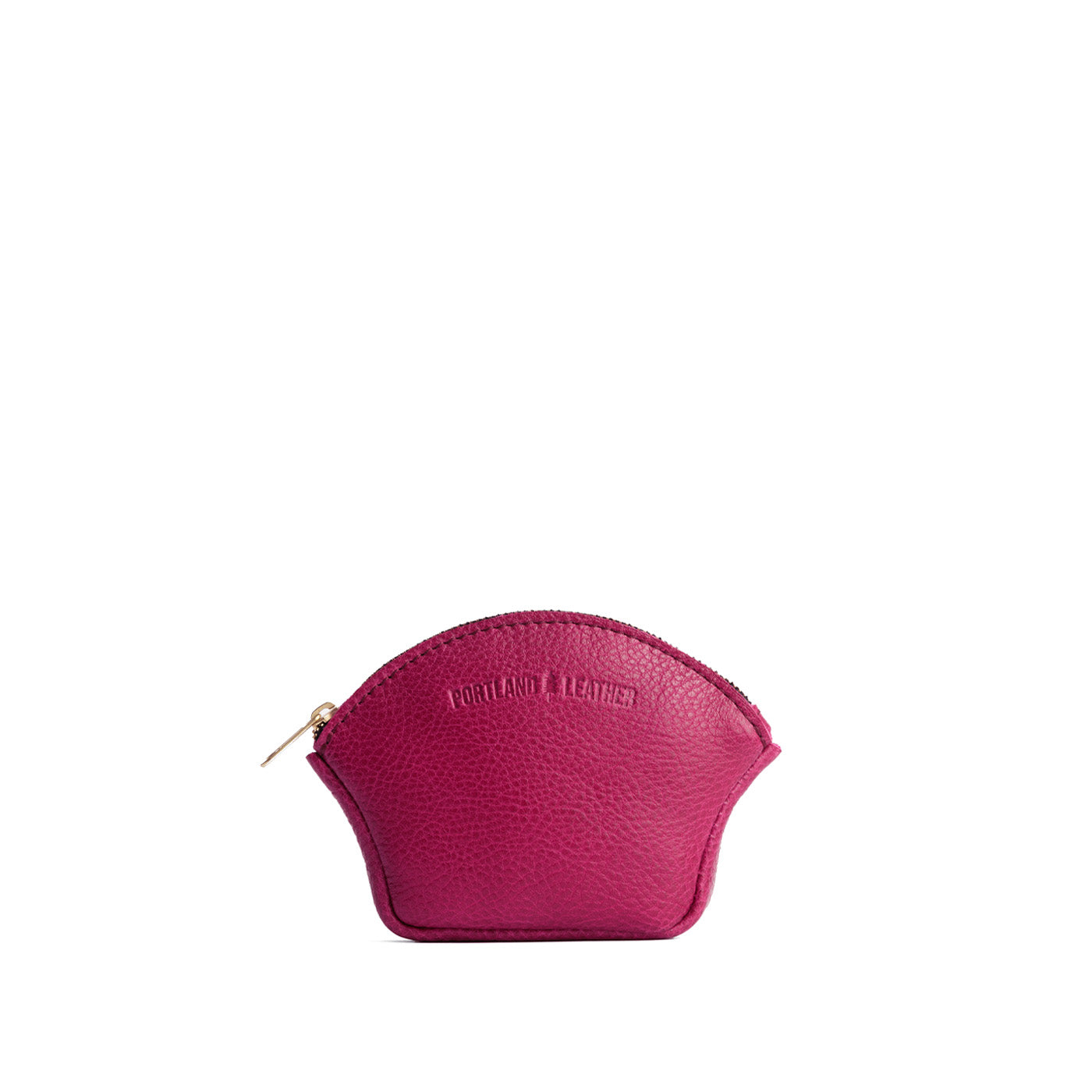 Cosmo*Small | Seashell shaped leather makeup bag with curved top zipper and flat bottom