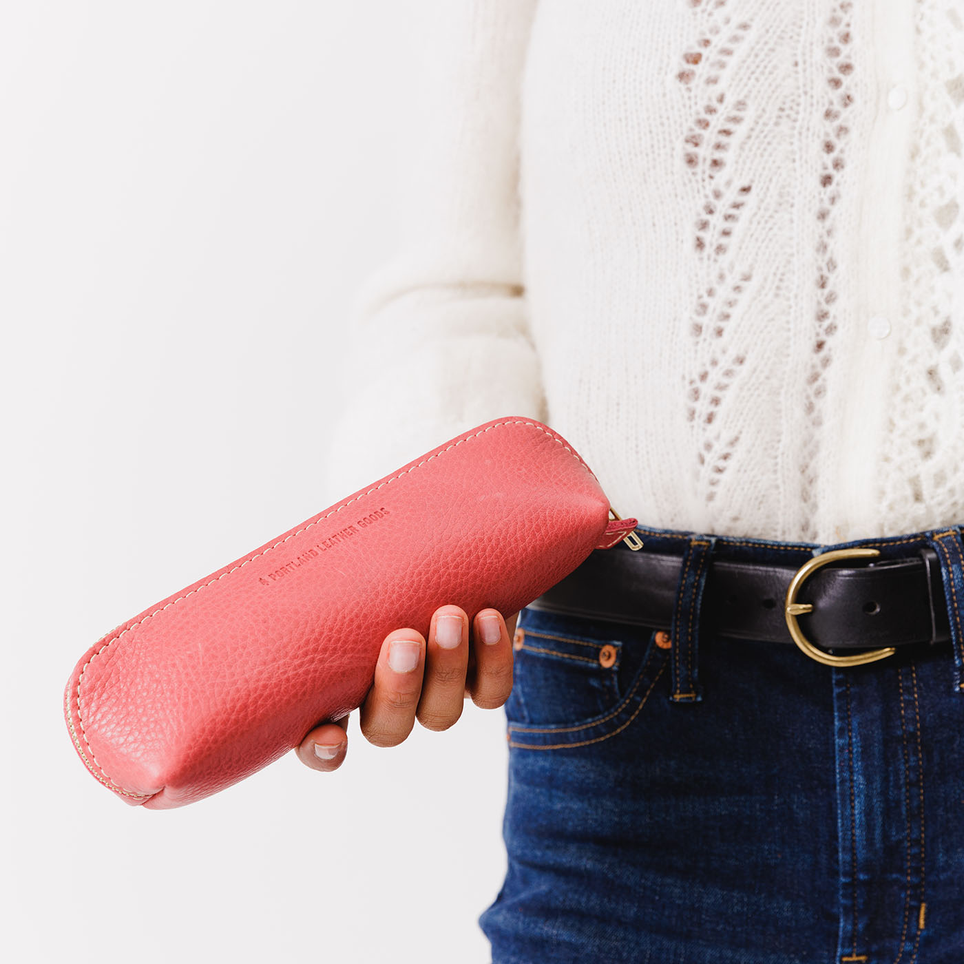 All Color: Sugar | Leather pouch with curved seams and top zipper