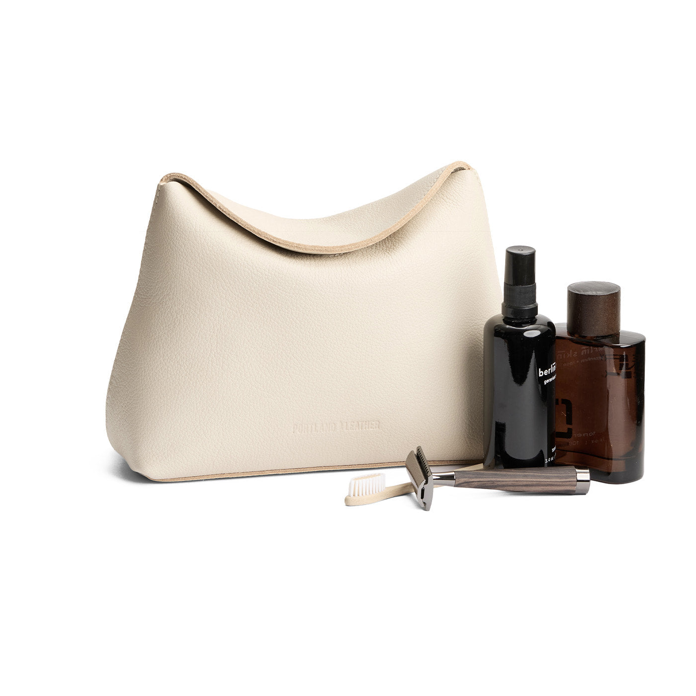 Pebbled Bone | Leather pouch with a folded magnetic closure
