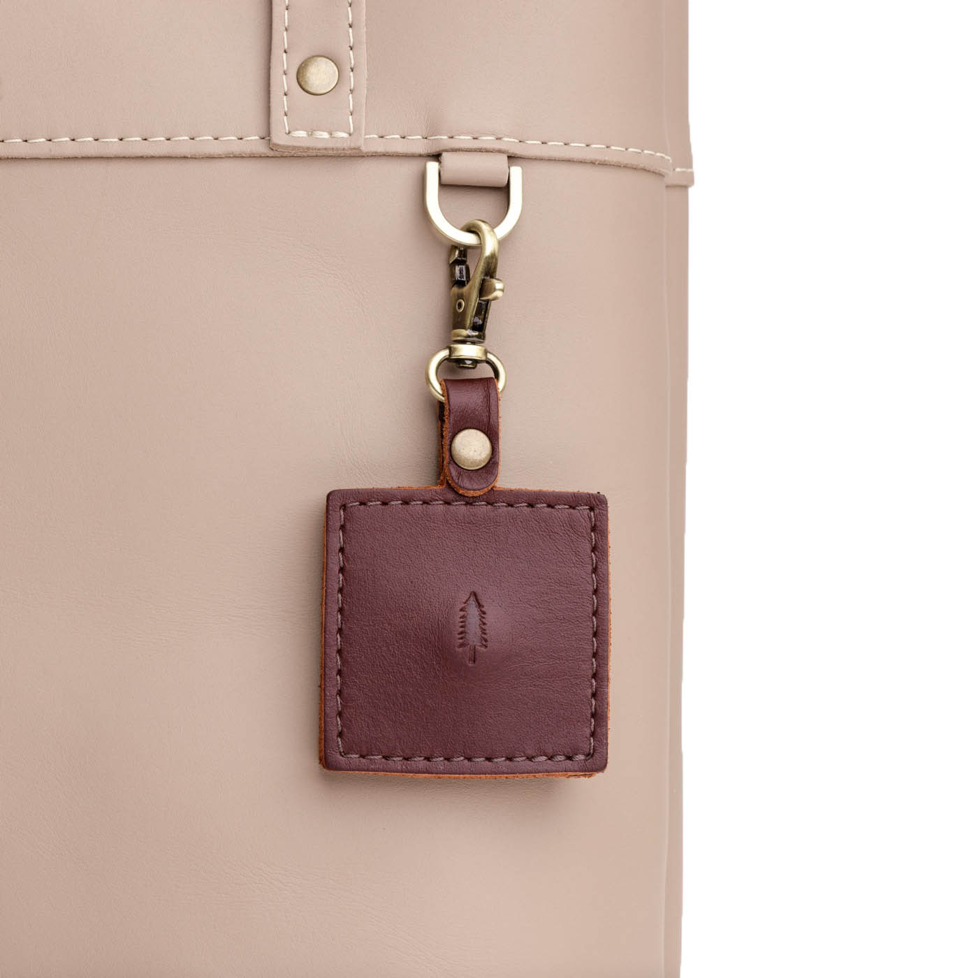 Cognac | Square-shaped leather AirTag holder with snap closure and swivel lobster claw clasp