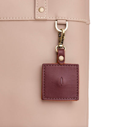 Cognac | Square-shaped leather AirTag holder with snap closure and swivel lobster claw clasp