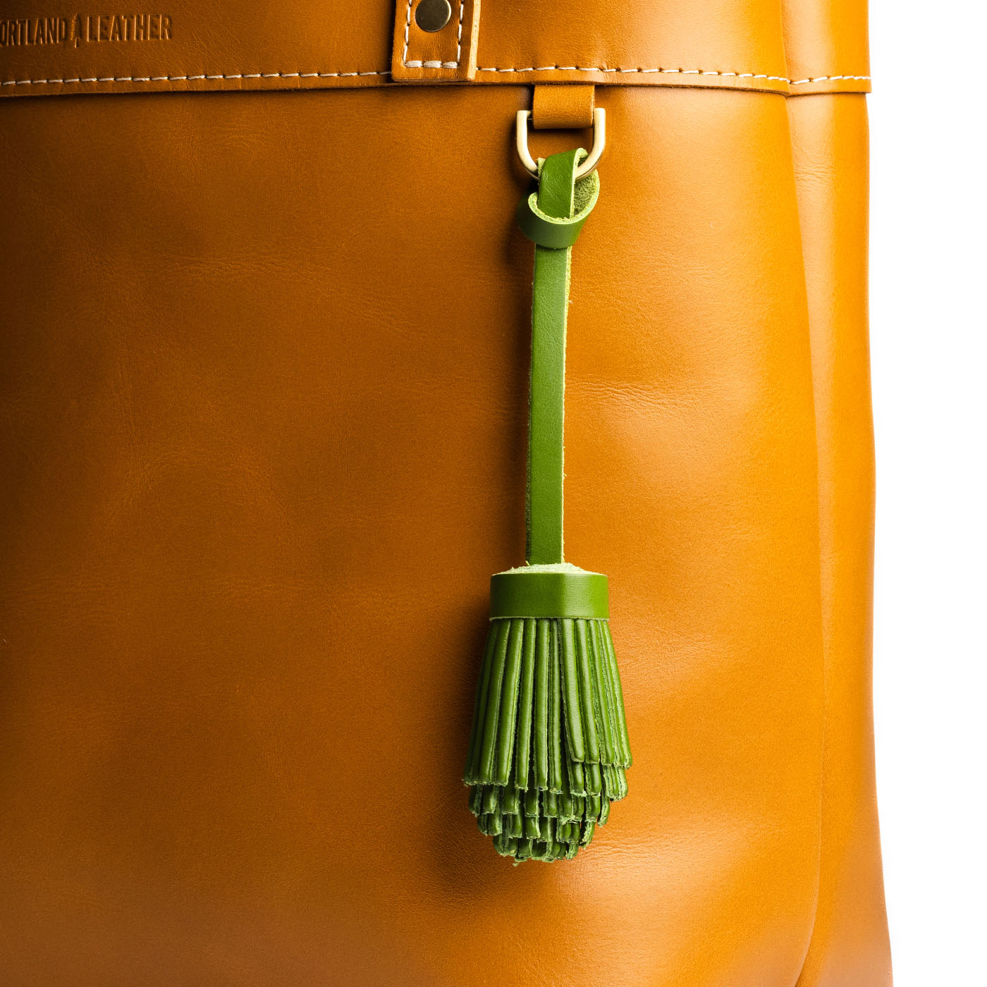 Green Apple | Pom-pom style with tiered leather fringe