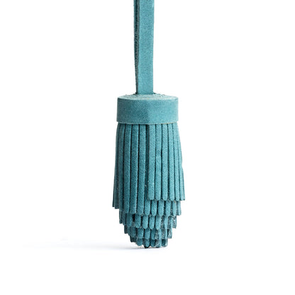 All Color: Aqua | Pom-pom style with tiered leather fringe
