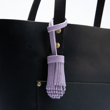 All Color: Lavender | Pom-pom style with tiered leather fringe