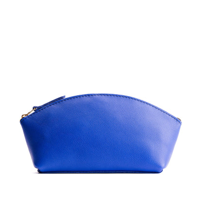 Astro Blue*Total Eclipse | Spacious leather makeup bag with curved seams and top zipper