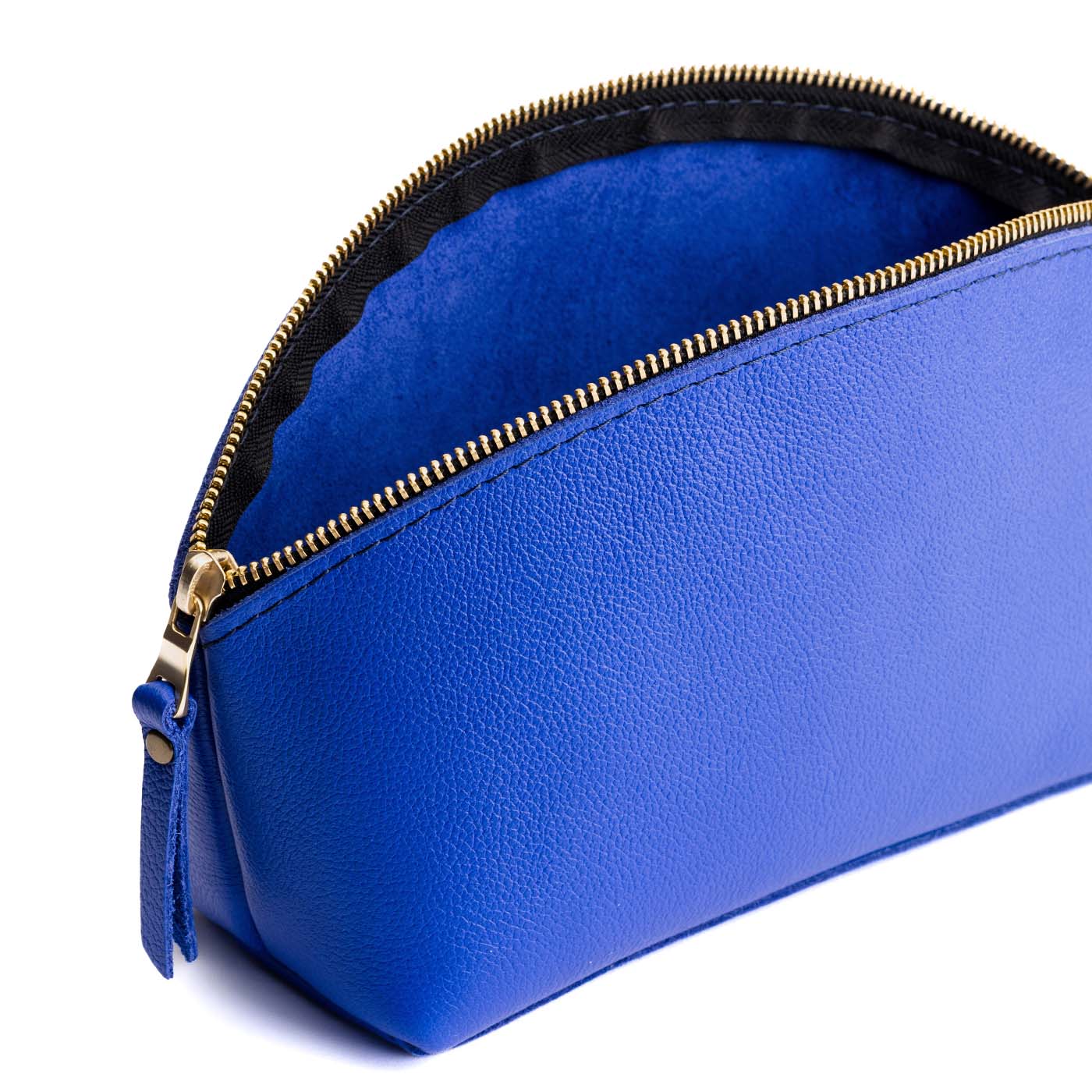 Astro Blue | Spacious leather makeup bag with curved seams and top zipper