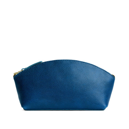 Caspian*Total Eclipse | Spacious leather makeup bag with curved seams and top zipper