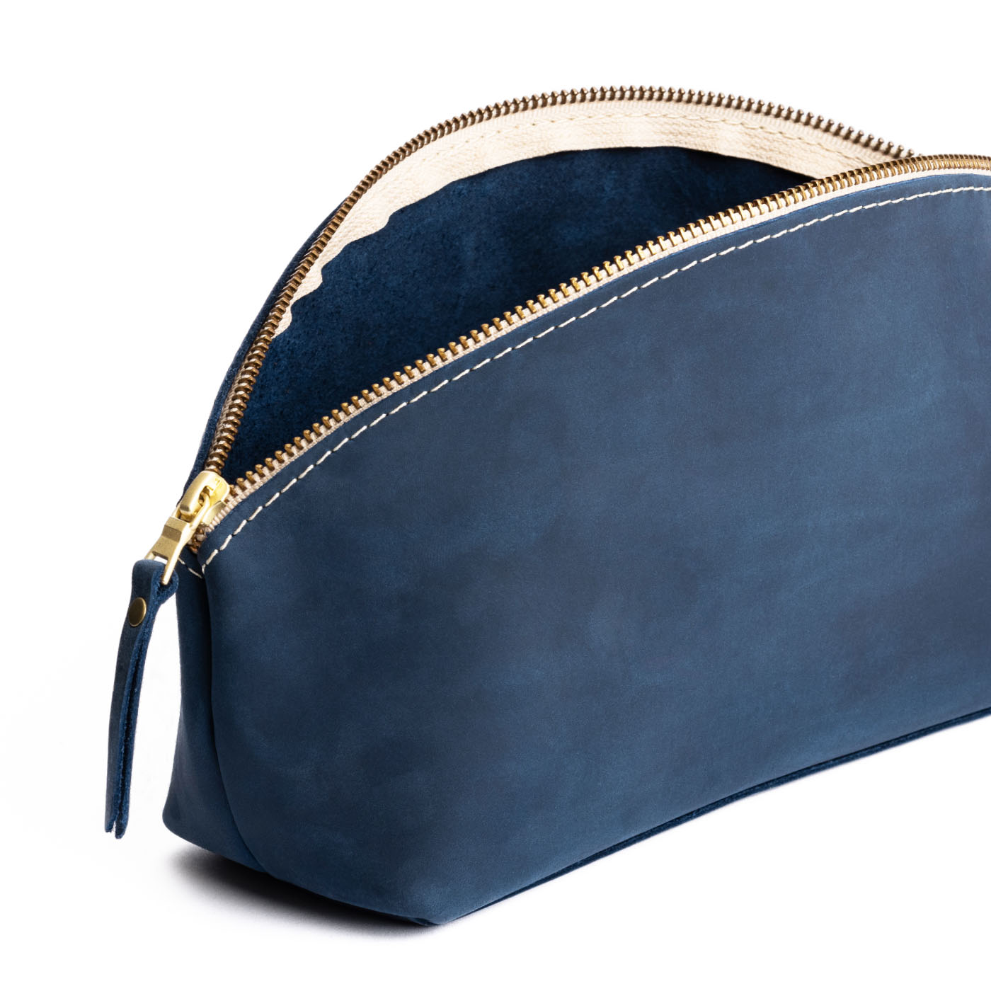 Deep Water | Spacious leather makeup bag with curved seams and top zipper open