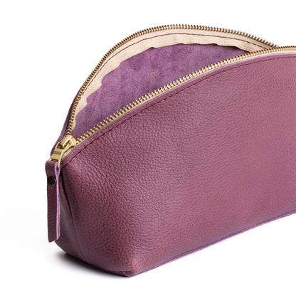 Kyoto | Spacious leather makeup bag with curved seams and top zipper open