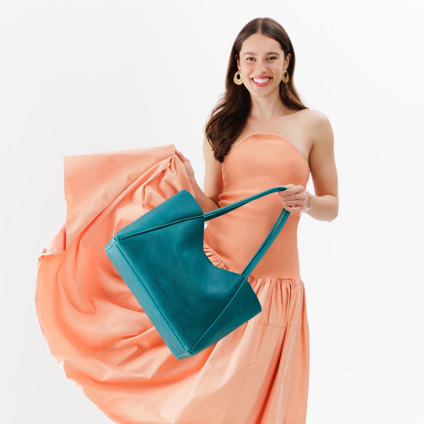 Aquarius*Large | Model holding large rectangular tote bag