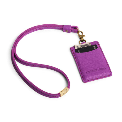 Cattleya | A leather lanyard attached to a matching card holder on a white background