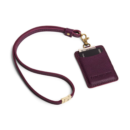Plum | A leather lanyard attached to a matching card holder on a white background