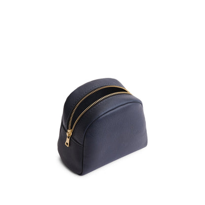 Night Owl | Curved top leather pouch with zipper opening, flat base, and three metal tree emblems in front