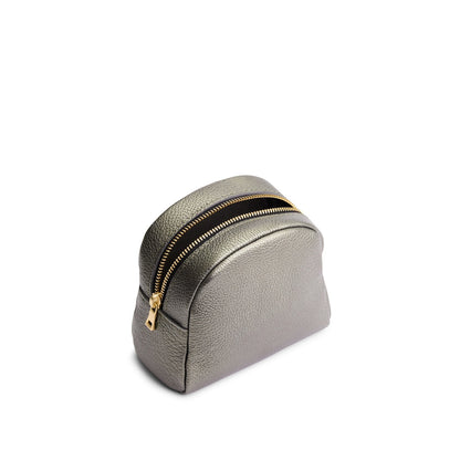 Stardust | Curved top leather pouch with zipper opening, flat base, and three metal tree emblems in front