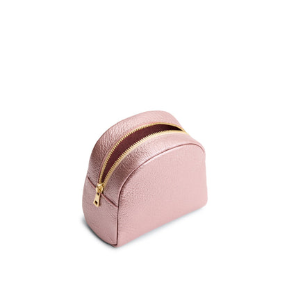 Supernova | Curved top leather pouch with zipper opening, flat base, and three metal tree emblems in front